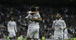 Alvaro Arbeloa celebrates scoring Real's third goal against Almeria with Javier Hernandez