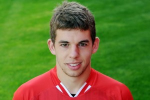 Young Liverpool full-back Jon Flanagan has signed a new contract with the Reds