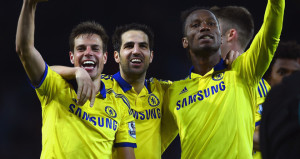 Chelsea players celebrate after defeating Leicester at the King power Stadium